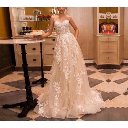 Sexy sleeveless A-line wedding dress with belt sweetheart neckline backless applique lace bridal gown