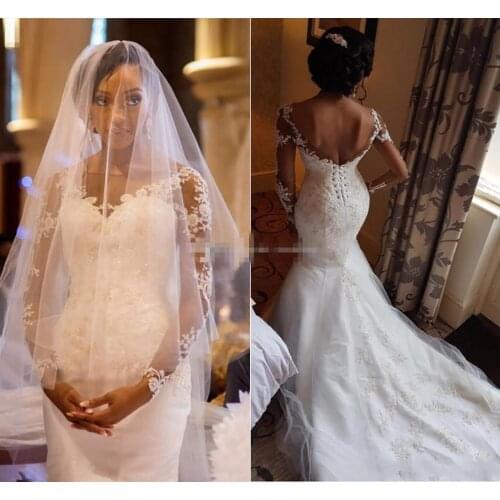 Mermaid Wedding Dresses Bateau Neck Long Sleeves Appliques Lace Tulle Backless African Bridal Dresses Church Wedding Gowns