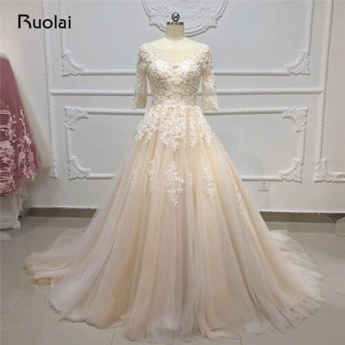 Champagne Wedding Dresses 2020 Half Sleeve Pearls Beaded Lace Wedding Gown Princess Ball Gown Bridal Gown Vestido de Novia RW32
