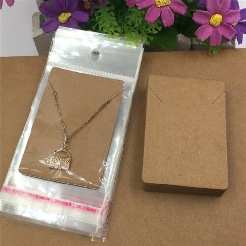 7.5x5cm 100Pcs +100Pcs Opp Bags Solid Colors Handmade Craft Paper Jewellery Cards Studs Earrings Collar Hand Chains Packing Card
