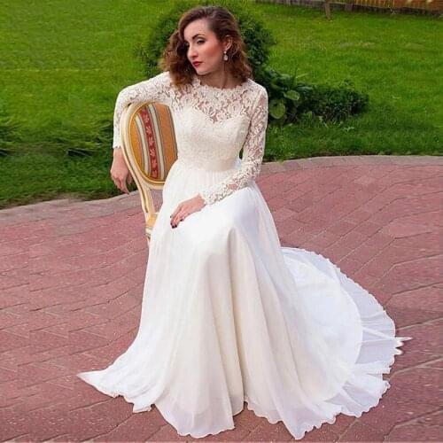 Latest Classic Ivory Lace Long Sleeve Bridal Wedding Dresses Jewel Neck Buttons Back Wedding Gowns for Bride with Bow Belt 2021