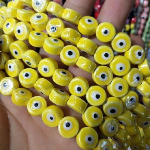 60PCS Nice Cute Ceramic Beads Withe Black Eye Flat Coin Shape Size 10MM For Womens Bracelets Making Accessories Good Sells