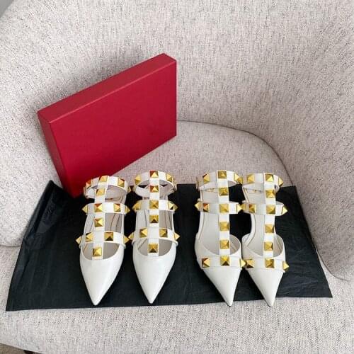 Simple fashion pointed thin medium heel sandals for women 2021 spring new rivet flat bottom shallow mouth Baotou sandals