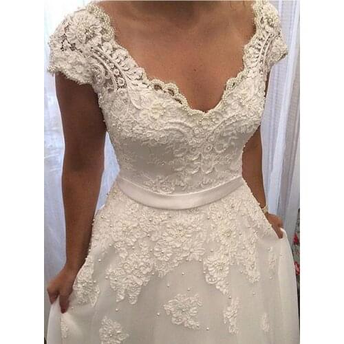 V Neck Cap Sleeve Wedding Dresses Beading A Line Open Back Applique Floor Length Bridal Dress with Sash Button Vestido De Noiva