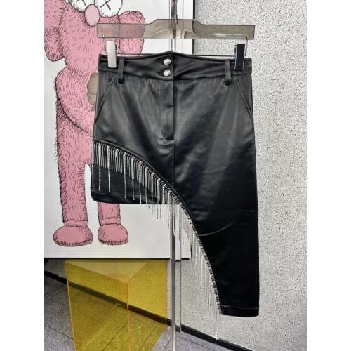 Fashion women 2021 new sexy solid color reflective surface nail drill irregular skirt 0316