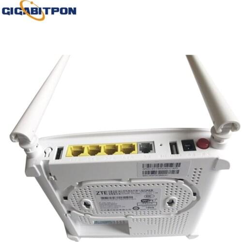 ZTE F673A V9 4GE +2 USB + Tel +2.4G&5G port dual English firmware SIP FTTH fiber optic terminal ONT with power supply and box