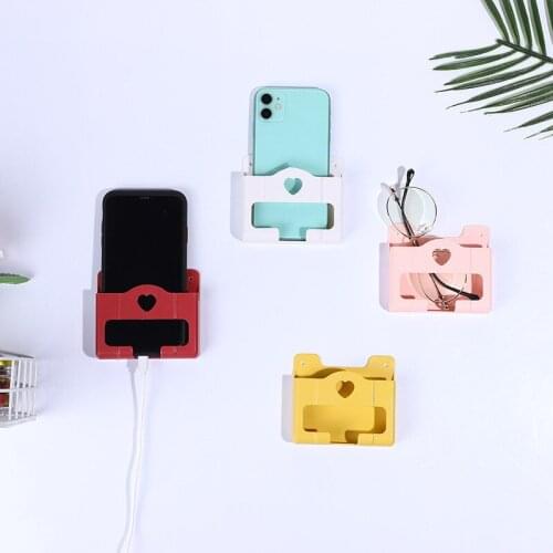 100Pcs Wall Mounted Mobile Phone Charging Organizer Remote Control Storage Box Phone Plug Wall Holder Stand Rack Socket Shelf