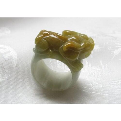 A cargo of natural jade bean seeds yellow emerold pull that ring the old crater Burma jade with certificate