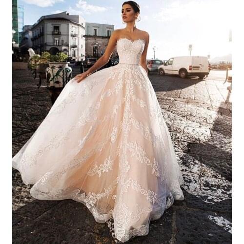Wedding Dress A-Line Sweetheart Lace Appliques Sequined Crystal Sashes Button Floor Length Sweep Train Gorgeous Bride Gown 2021