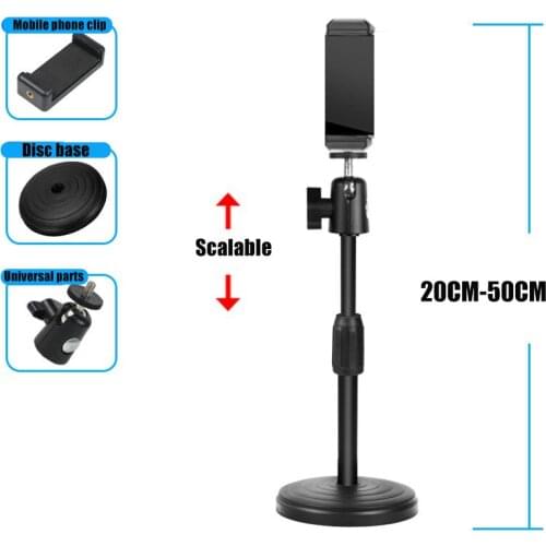 Mobile phone holder with retractable self timer / movie holder for stable use on the desk