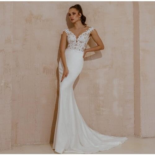 Charming Floor Lengh Mermaid Wedding Dresses Sexy Deep V-Neck Cap Sleeve Appliques White Lace Bridal Gowns 2021