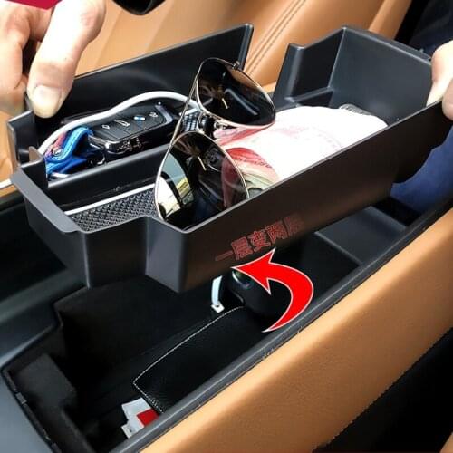 Suitable for 18-21 BMW new 5 series 6 series GT central control storage box 530li armrest box door handle storage box