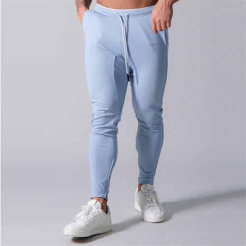 2021 Men Pants Fitness Casual Elastic Pants men Bodybuilding Clothing Casual black Sweatpants Joggers Pants