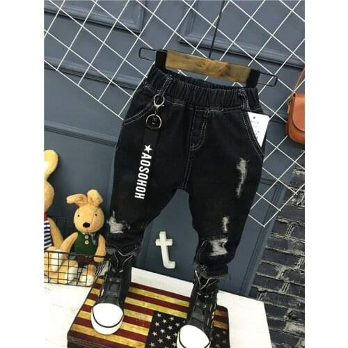 New Kids jeans Childrens clothes Korean baby girls and boys jeans. Personality matte hole stretch trousers 2-6years