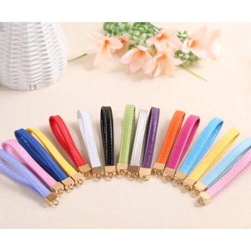 11.5 cm PU glossy color flat leather rope keychain, bell pendant, key ring buckle, bag hanging, car hanging, DIY manual