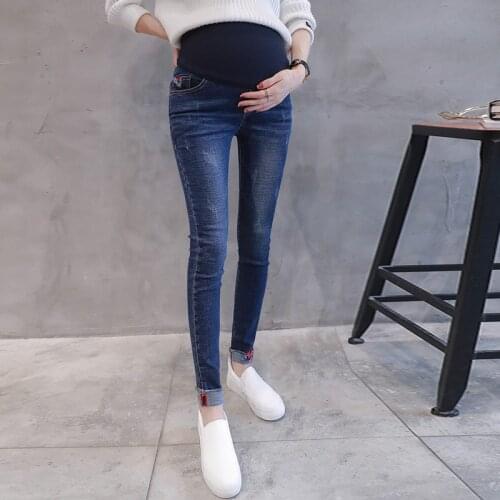 Leather high elastic pregnant women pants stomach lift pants Korean pregnant women jeans slim pencil pants