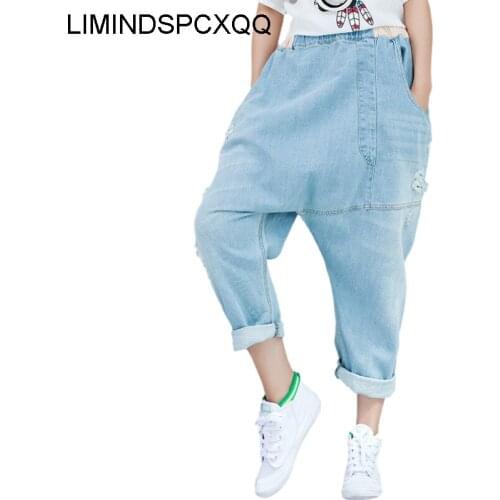 Womens Denim Cross Baggy Pants 2021 Jeans Casual Loose Personalized Irregular Bleached Trousers Harajuku Hip Hop Hole Distressed