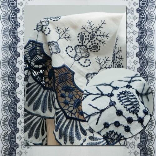 Navy floral embroidery on white silk blends cotton hollow fabric, sewing for shirt, skirt, dress, curtain, craft by the yard