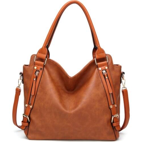 Womens bag 2019 Europe and the United States new generous package hand strap shoulder slung ladies wild bag