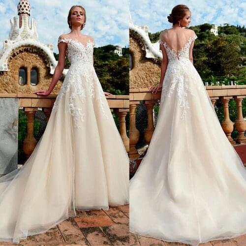 Amazing Tulle Jewel Neckline Natural Waistline A-line Wedding Dress Applique Champagne Bridal Dress robe de mariée