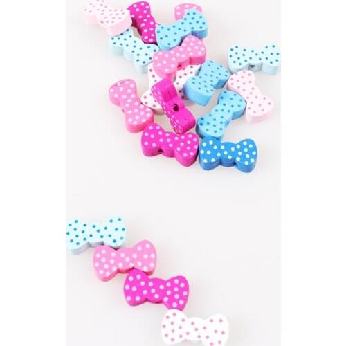 50pcs Mixed Bowknot Pattern Wooden Spacer Beads For Jewelry making DIY 21x11mm