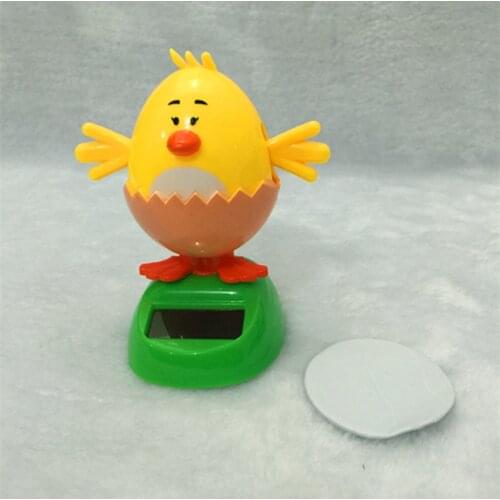 Interior decoration gifts head Eggshells Solar Swing Flowers Car Interior Decoration Gifts Home Furnishings Animal Shaking Head