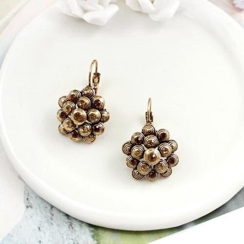 Brown spiral round glass stone stitching into flower shape earrings personality creative retro style womens accessories