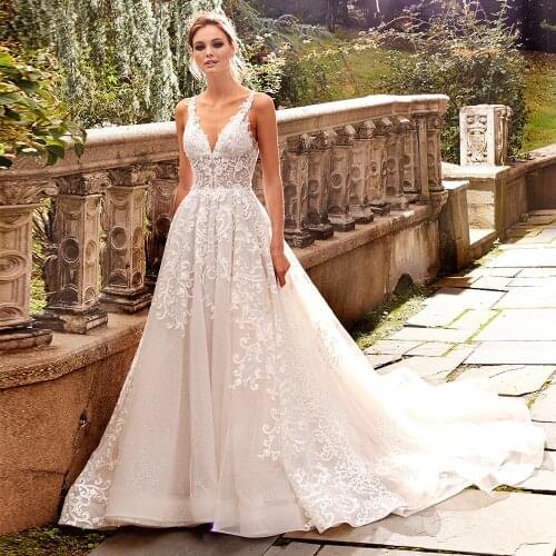 Vestidos De Novia A-Line Wedding Dress Beading Pearls Vintage Robe Mariage V-Neck Backless Abito Da Sposa Bridal Gowns