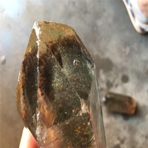 A natural Brazilian crystal green ghost stone, big green ghost stone point