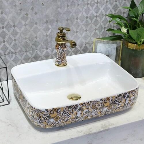 China Artistic Ceramic wash basin flower Counter top ceramic sink antique oval ceramic wash basin bathroom sink