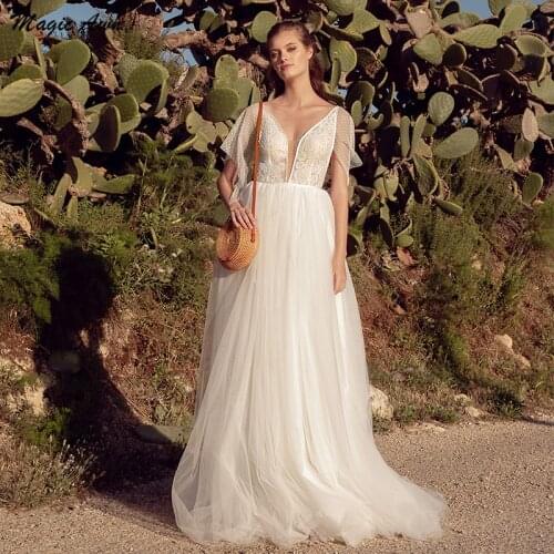 Magic Awn New Boho Wedding Dresses Lace Appliques Polka Dots Tulle V-Neck Cap Sleeve Illusion Country Bridal Gowns Robes Mariage