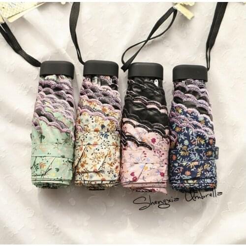 NewWomens mini portable five-fold umbrellas Girls pockets umbrellas Small fresh small floral black umbrellas