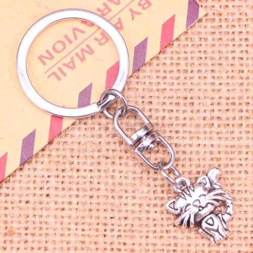 New Fashion Keychain 19x17mm smiling cat Pendants DIY Men Jewelry Car Key Chain Ring Holder Souvenir For Gift