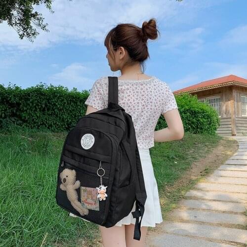 Waterproof Large-capacity Travel Backpacks Fashion Womens Backpack Cute Doll Pendant Solid Color Schoolbags Of Girls Nylon