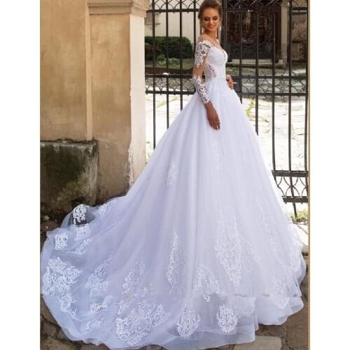 Gorgeous White Wedding Dress Full Sleeve Illusion Lace Appliques Sheer Neck Court Train Long Bridal Gowns Arabic Garden 2021