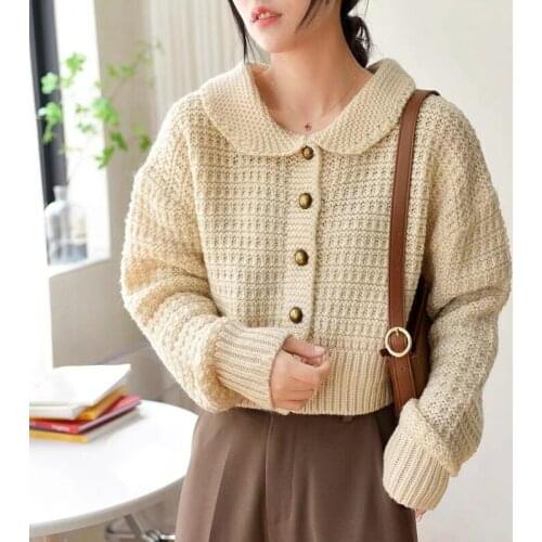 2021 autumn and winter new Korean version age reducing college style doll collar knitted loose long sleeve coat sweater women