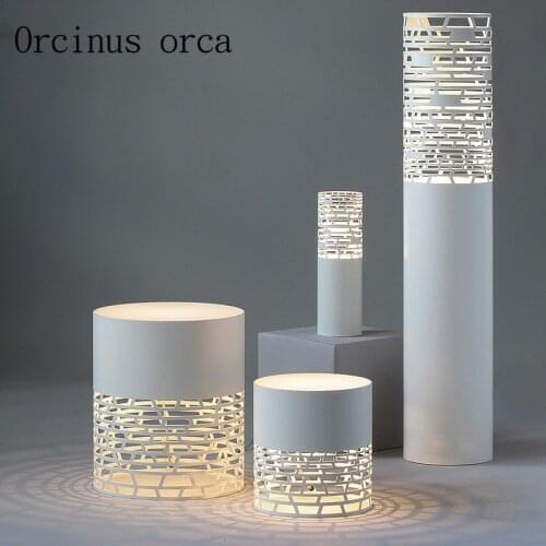 Modern minimalist floor lamp living room bedroom storage hollow carved Nordic creative sofa bedside table lamp free shipping