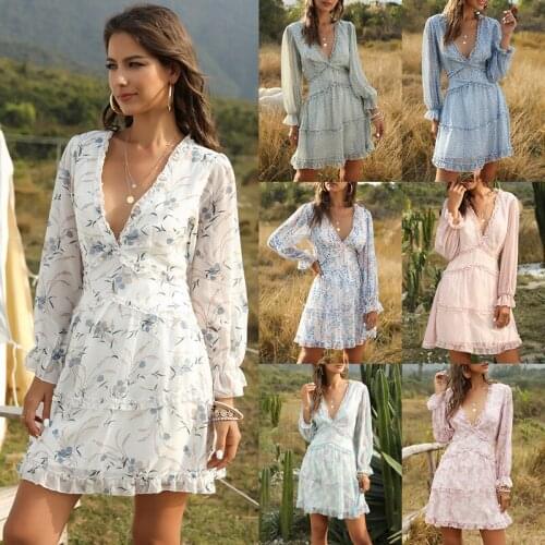 Summer new European and American hot sale sexy leaky back ladies dress female ruffled stitching V-neck floral beach dress