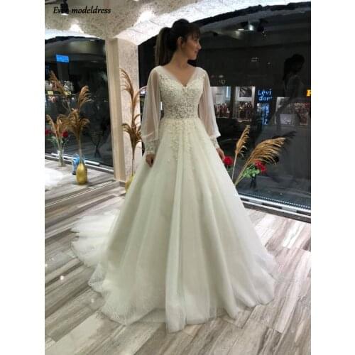 New Lace Boho Wedding Dresses Long Sleeve V Neck Illuson Top Appliques A Line Beach Bride Gowns Cheap Robe De Mariee 2021