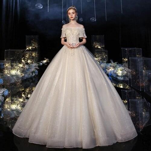 Glitter Luxury Wedding Dresses Beads Boat Neck 2021 Sequin Floor Length Bride Gowns Princess Church Bridal Dress Custom Made