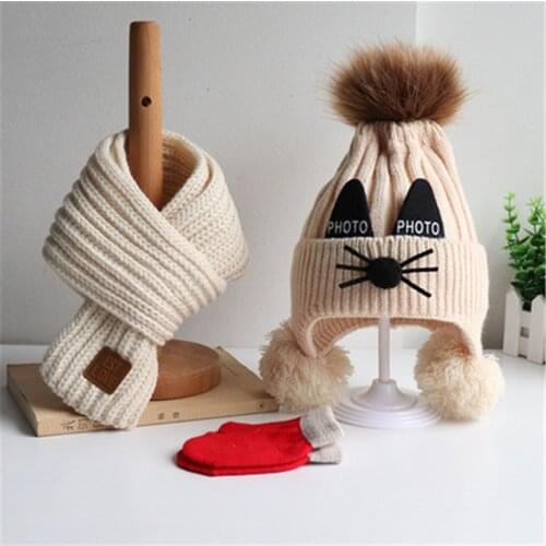 A three-piece set of childrens hat and scarf gloves for autumn winter Boys girls lovely thick knitted woollen cute cats hats