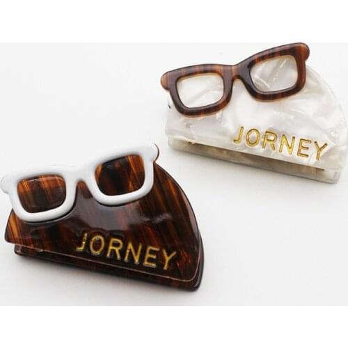 Sunglasses hat hair claws