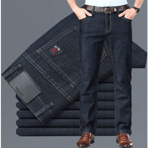 Spring and summer mens pure black jeans loose straight cotton stretch all-match youth business casual mens pants summer