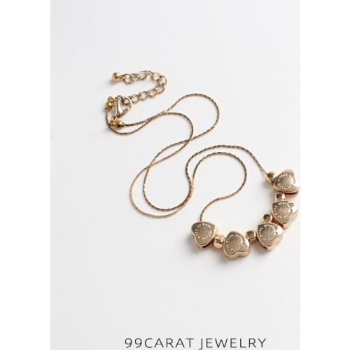 Nine carat European and American fashion heart-shaped fringe printed gold short necklace