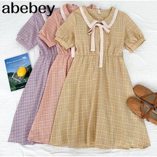 2021 New Summer Women Fashion All-match doll collar puff sleeve Dress hit color lace up Bow plaid Dress