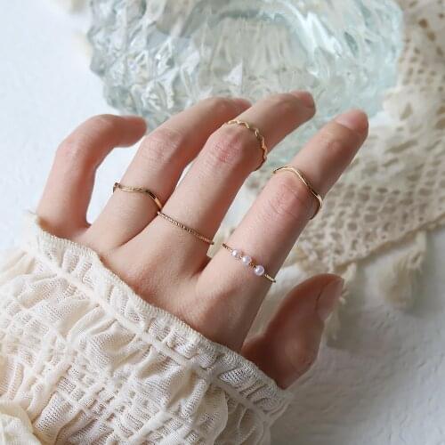 5pcs Korean Temperament Fashionable and Popular Womens Multi-layer Ring Twist Pearl Opening Beautiful Hand-tail Ring Set