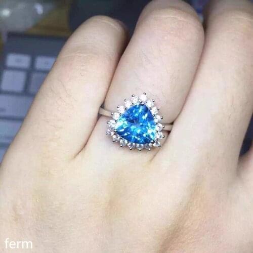 KJJEAXCMY fine jewelry 925 sterling silver inlaid natural blue topaz ring with smooth curves and a bold triangle