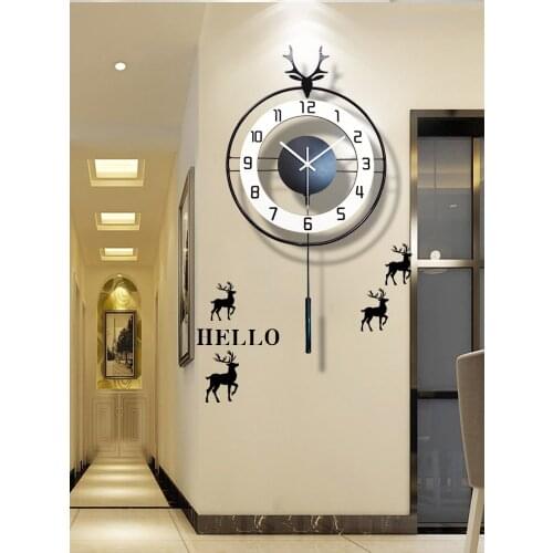 Deer clock hanging clock living room modern simple creative light luxury net red fashion household clock hanging wall