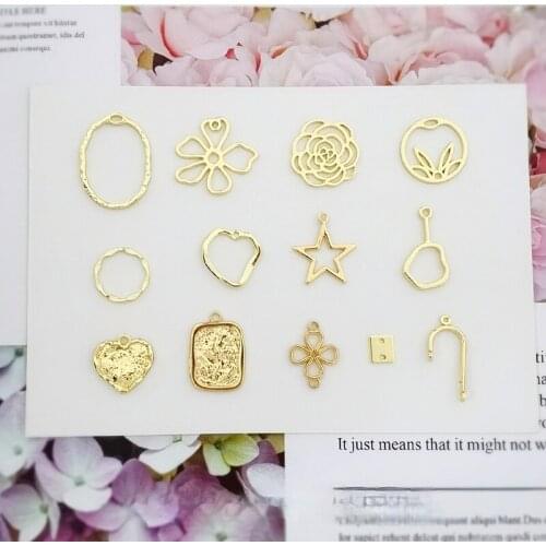 Color-preserving alloy flower umbrella handle four-leaf clover five-pointed star shaped peach heart pendant DIY earring material