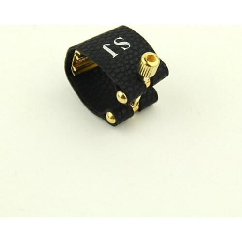 Boquilla de metal para saxofón, Ligadura de boquilla